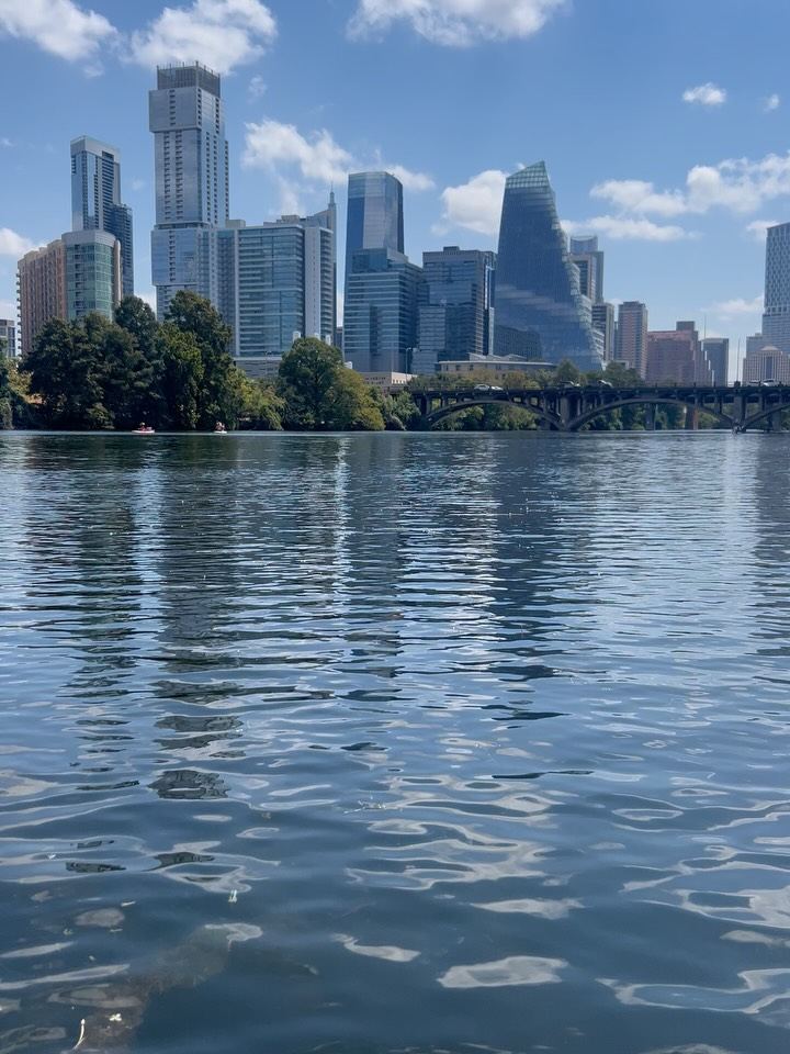 The Austin skyline across Lady Bird Lake on a clear day